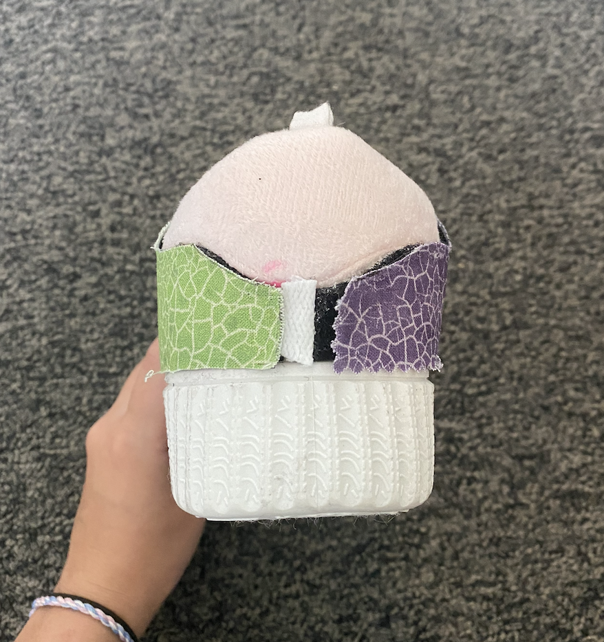 Heel view showing velcro strips holding two panels